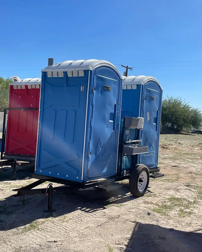 Towable job-site porta potty trailer on a pipeline job in Midland County, TX
